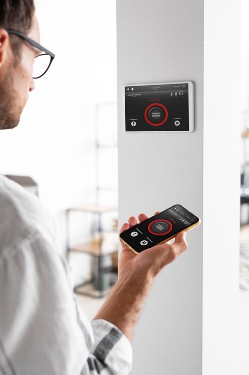 person-using-smartphone-his-automated-home_23-2149036905